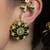 Gold plated kundan green stone earrings