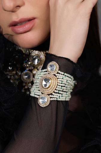 Gold plated kundan pearl bracelet
