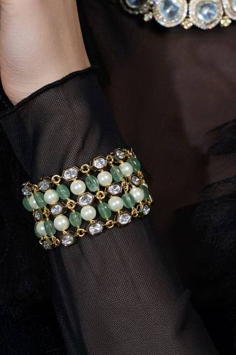 Gold plated kundan green stone bracelet