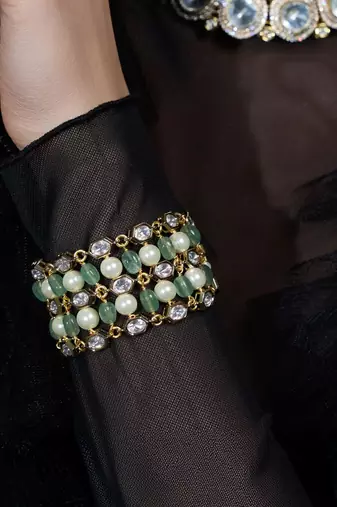 Gold plated kundan green stone bracelet