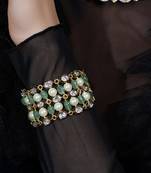 Gold plated kundan green stone bracelet
