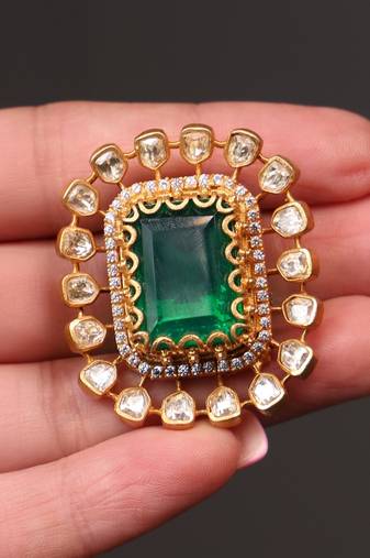 Gold plated kundan green stone earrings