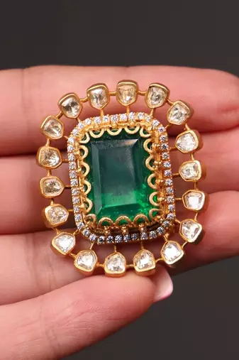 Gold plated kundan green stone earrings