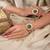 Gold plated kundan green stone bangle