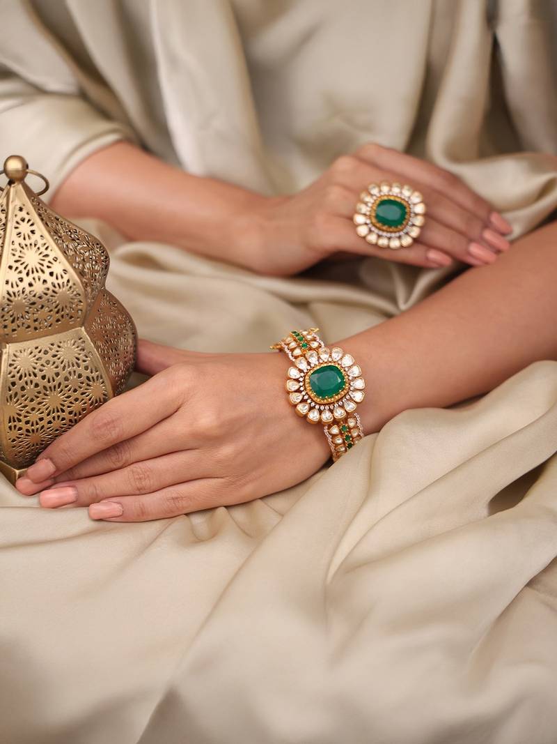 Gold plated kundan green stone bangle
