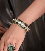 Gold plated kundan green stone bangle