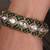 Gold plated kundan green stone bangle