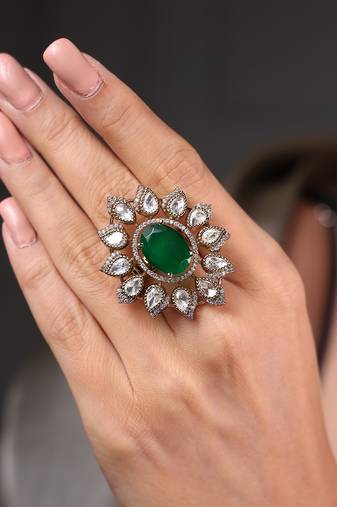 Gold plated kundan green stone ring