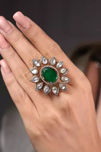 Gold plated kundan green stone ring