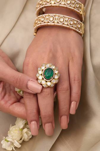 Gold plated kundan green stone ring