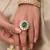 Gold plated kundan green stone ring