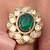Gold plated kundan green stone ring