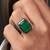 Gold plated kundan green stone ring