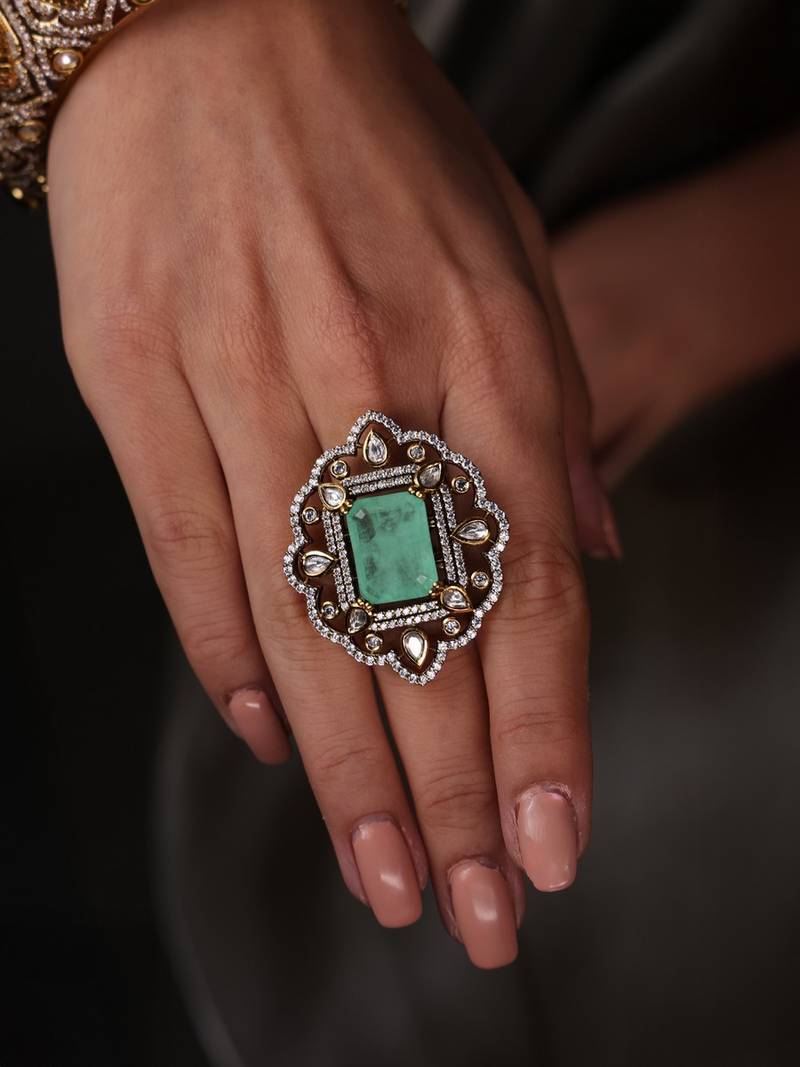 Gold plated kundan green stone ring