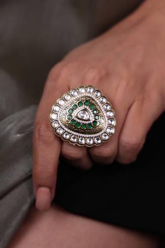 Gold plated kundan green stone ring
