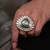 Gold plated kundan green stone ring