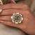 Gold plated kundan green stone ring