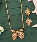 Elegant gold-plated pendant and earring set with red and green stones