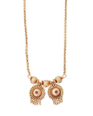 Elegant gold-plated pendant and earring set with red and green stones 4