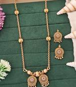 Antique gold-plated designer chain pendant set with earrings – red & green stone embellishments