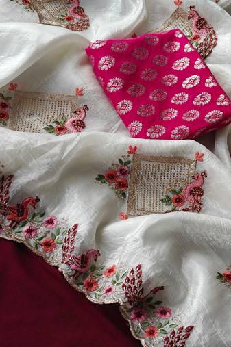 White crush saree Blend with beautiful shivroski and zari Work with cutwork border and peacock embroidery 