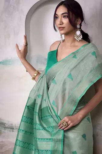 Light turquoise  cotton weaving zari border casual wear saree