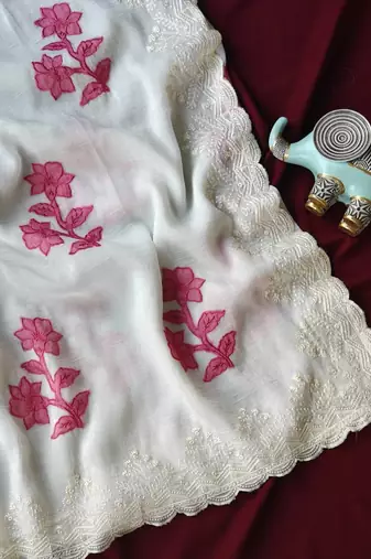 White crunchy silk blend Saree with applique work pattern all over the Saree with embroidery and scallop Border