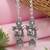 Traditional jhumka motif oxidised earring with ear chain for women (e3389ox)