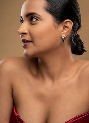 Gold plated green stone dangler earrings in sterling silver 1