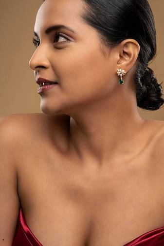 Gold plated green stone dangler earrings in sterling silver