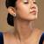 Gold plated green stone stud earrings in sterling silver