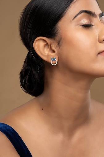 Gold plated blue stone stud earrings in sterling silver
