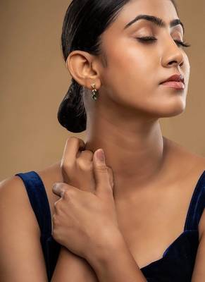 Gold plated green stone dangler earrings in sterling silver 1