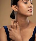 Gold plated green stone dangler earrings in sterling silver