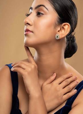 Gold plated green stone stud earrings in sterling silver 1