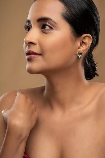 Gold plated green stone stud earrings in sterling silver