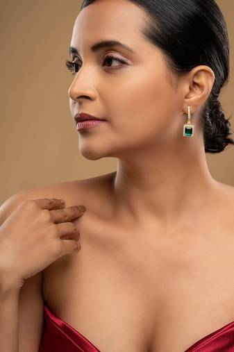Gold plated green stone dangler earrings in sterling silver