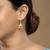 Gold plated dangler earrings in sterling silver