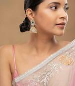 Gold plated green stone jhumkas in sterling silver