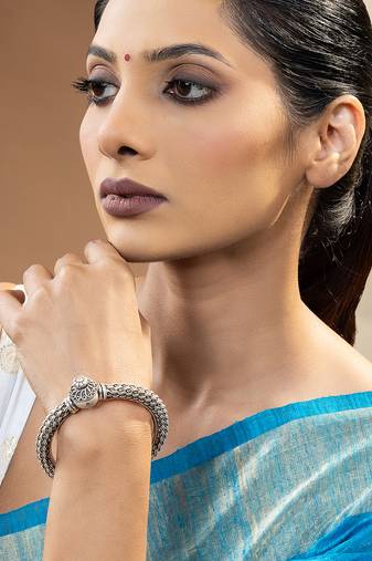 Ornamental woven silver kada