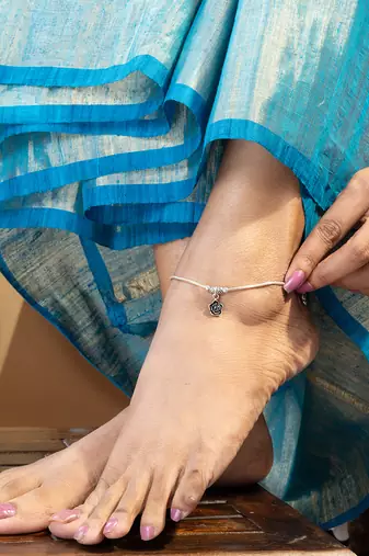 Silver floral charm anklet