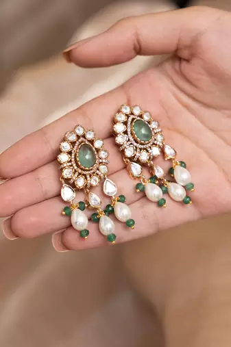 Gold plated green stone kundan dangler earring