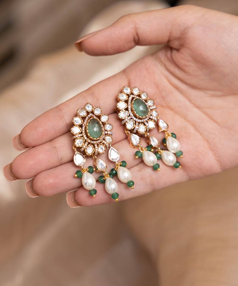 Gold plated green stone kundan dangler earring