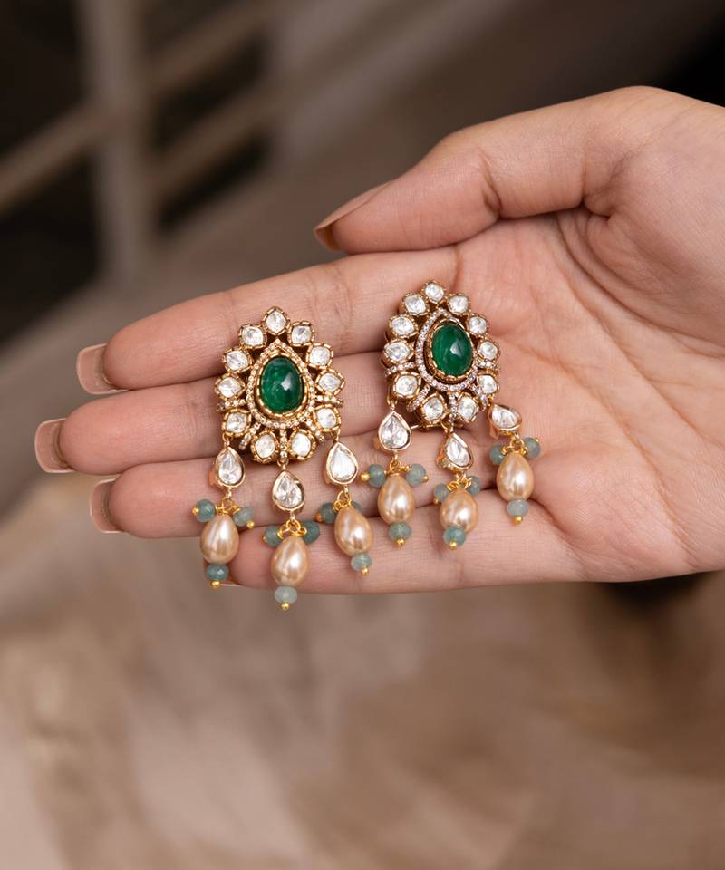 Gold plated green stone kundan dangler earring
