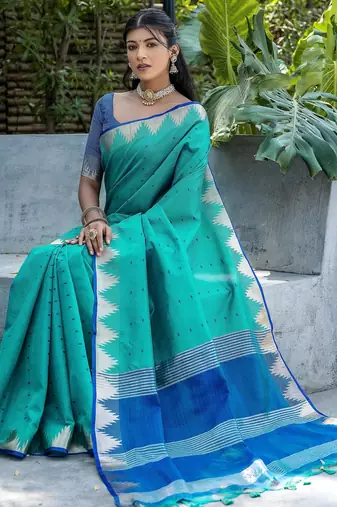 Rama color semi tussar silk blend saree with all over bandhani style butti weaves saree with blouse