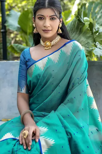 Rama color semi tussar silk blend saree with all over bandhani style butti weaves saree with blouse