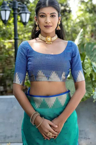 Rama color semi tussar silk blend saree with all over bandhani style butti weaves saree with blouse