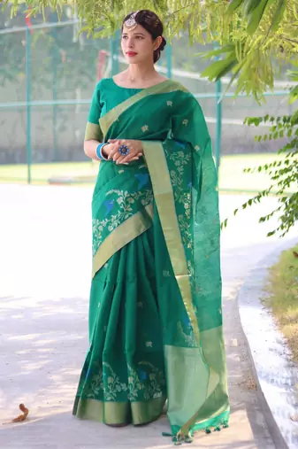 Green color pure linen silk jamdani type weaving border saree with blouse