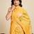Yellow chinon saree with unstiched blouse