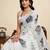 white linen saree with unstiched blouse